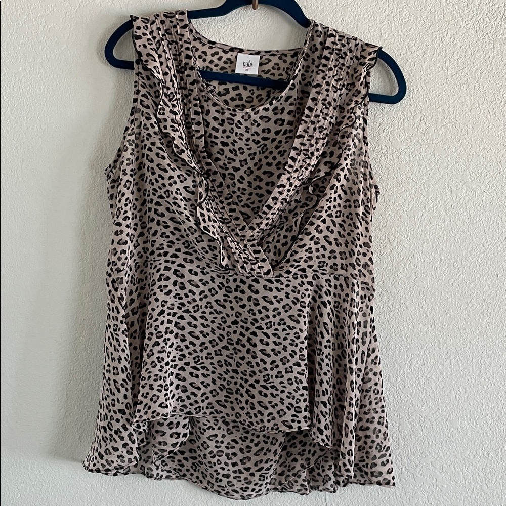 CAbi Animal Print Ruffle Blouse in Black and Tan